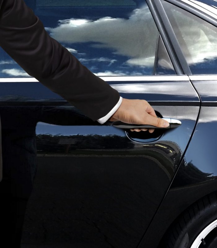 Driver hand opening car door